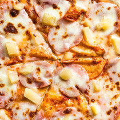 filling of pizza with ham and pineapple