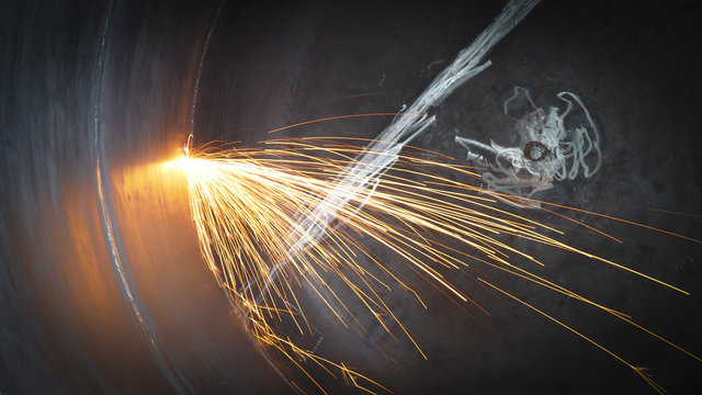 Gas cutting of steel with acetylene and oxygen , Industrial welding part in Oil and Gas or Petrochemical or Vessel 