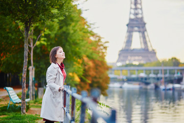Young woman in Paris near the Eiffel tower