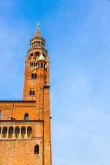 Fototapeta na wymiar View on the famous Torrazzo bell tower in Cremona, Italy on a sunny day.