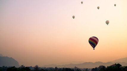 hot-air balloons flying over on mountain Vang Vieng,Laos 