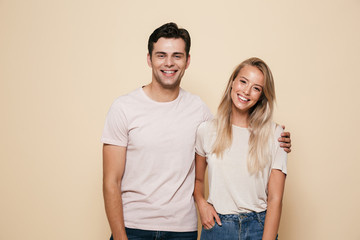 Portrait of a smiling young couple standing together