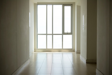Obraz na płótnie Canvas image of windows in modern office building.empty long corridor in the modern office building.