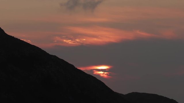 a firey vivid sunset in hte picos de europa, asturia, spain
