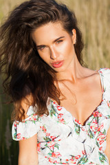 Naklejka premium Portrait close up of young beautiful brunette woman