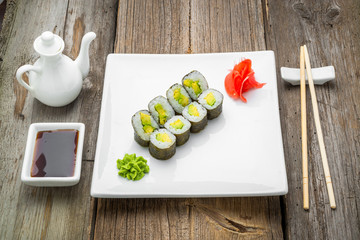 Fototapeta na wymiar Japanese traditional sushi food and rolls with fresh seafood