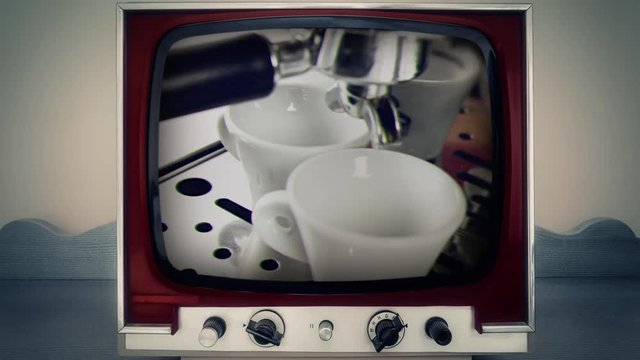 A retro vintage TV showing two cups full of coffee pouring from a machine.

