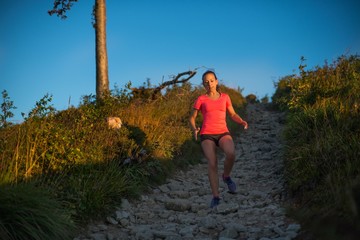 Girl trail running.