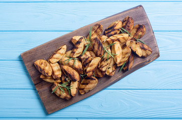 Homemade grilled potatoes with rosemary