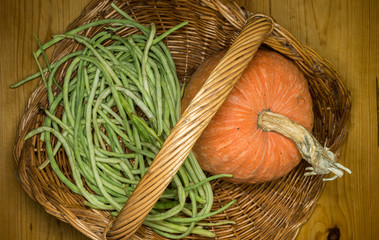 Pumpkin and young beans in the basket