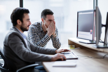 Coworkers having problem with computer in office