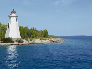 Lone lighthouse on the shore