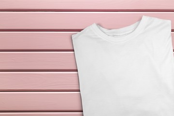 T-shirt on pink desk