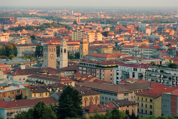 Fototapeta na wymiar Bergamo, Italy August 18, 2018: Panoramic view from above to the evening city.