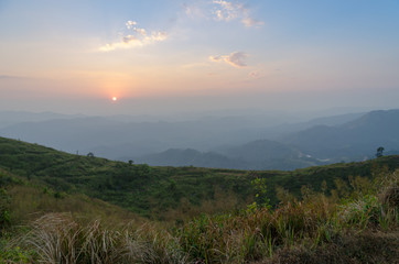 Mountain field during sunset. Beautiful natural landscape, Kanchanaburi, Thailand