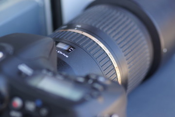 Plakat camera lens on black background