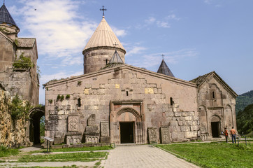 Fototapeta na wymiar Two-storey narthex with a visible dome of the Church of Gregory the Illuminator,Goshavank Monastery in the village of Gosh, near the town of Dilijan