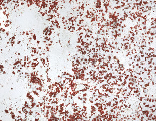 Muro con tinta rossa a macchie - particolare 2x