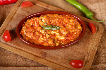 Omelettes tomato  in a pit
