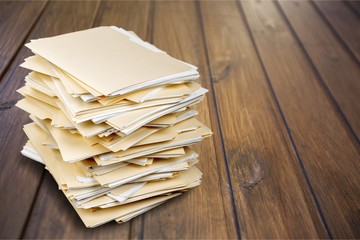 File folders with documents on white background