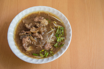 Chinese noodle soup with pork.