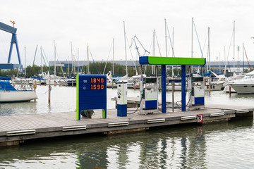 Petrol station for boats and yachts with a pier in the marina © scharfsinn86