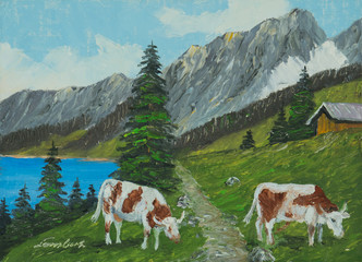 Fototapeta na wymiar Berglandschaft mit See und Kühen im Vordergrund