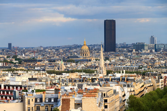 View of the Montparnasse skyscraper and Invalides seen from the Arc de Triomphe in the afternoon in Paris, France
