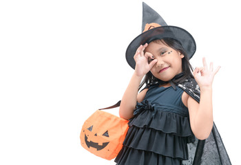 funny child girl in witch costume for Halloween