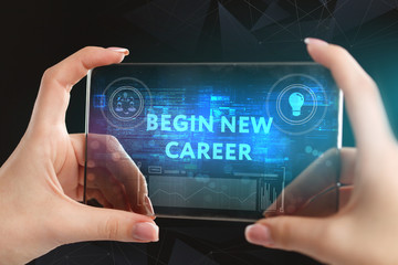 The concept of business, technology, the Internet and the network. A young entrepreneur working on a virtual screen of the future and sees the inscription: begin new career