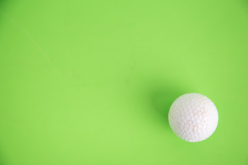 golf ball on green background