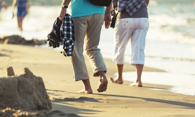 Close-up portrait of an elderly couple hugging