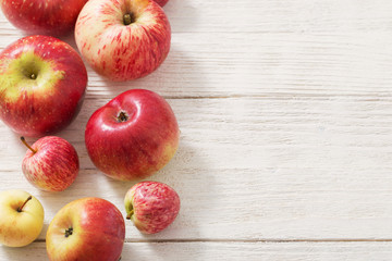 apples on wooden white background