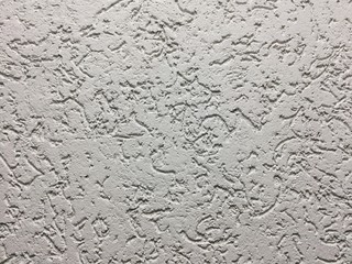 background, texture, white decorative plaster on the wall