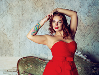 beautiful young woman  wearing a red dress
