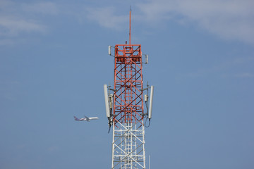 Mobile phone tower in blue sky
