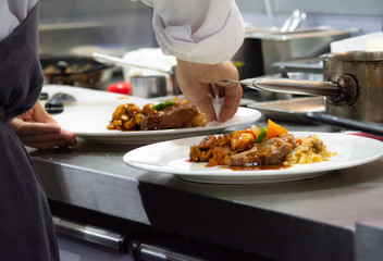 Chef preparing food, meal, in the kitchen, chef cooking, Chef decorating dish, closeup, chef at work