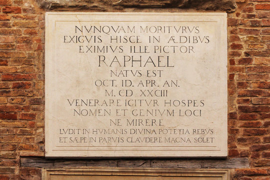 Raffaello street, marble plaque in front of the house of Raffaello Sanzio, Urbino, Italy
