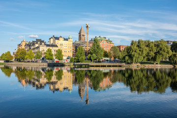Norrköping waterfront and Motala river on a quiet Sunday evening in early September. Norrkoping is...