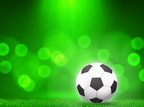 soccer ball on grass with  green bokeh  background