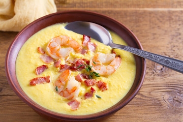 Creamy corn vegetable soup with shrimps and bacon