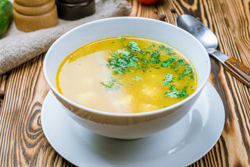 Chicken soup bouillon in a plate