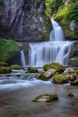 French landscape - Jura. Waterfall in the Jura mountains after heavy rain.