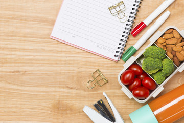 preparing lunch for child school top view on wooden background