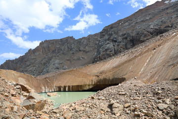 Bogdanovich glacier with the mountain lake