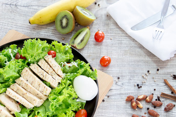 Top view Healthy and Clean Food mix fruit and vegetable ,Healthy eating mix of fresh vegetables salad topped on wooden table