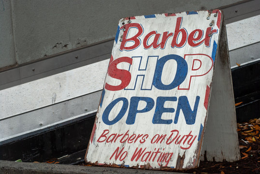 Weathered barber shop open sign
