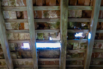 Spanish colonial home roof in ruins