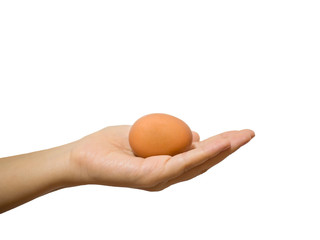 The egg are in the woman's left hand on isolated white background