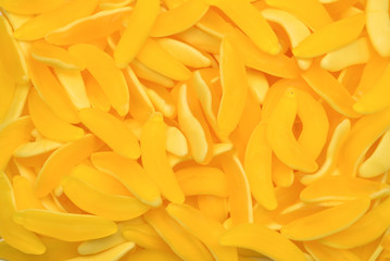 Yellow banana gummy candies. Top view. Jelly  sweets.